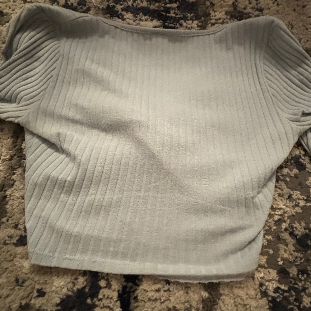 A light blue T-shirt top